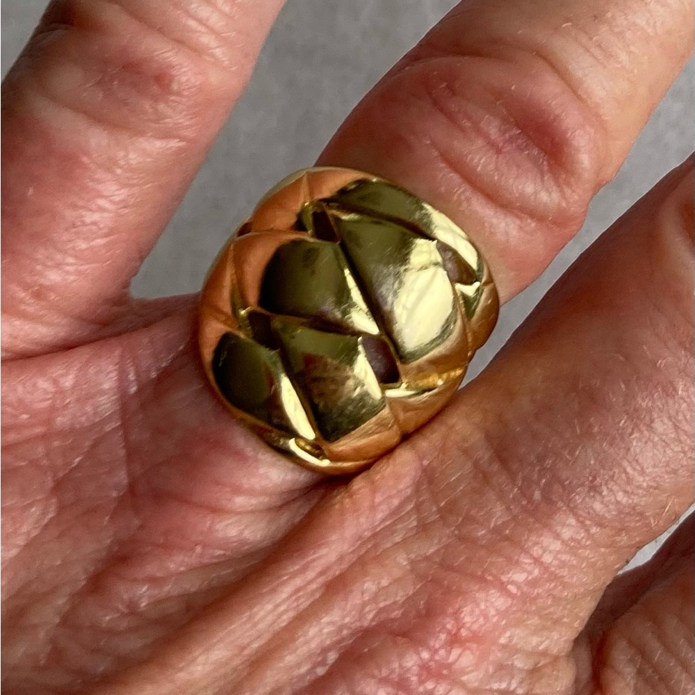 14k plated Gold braided design band ring.